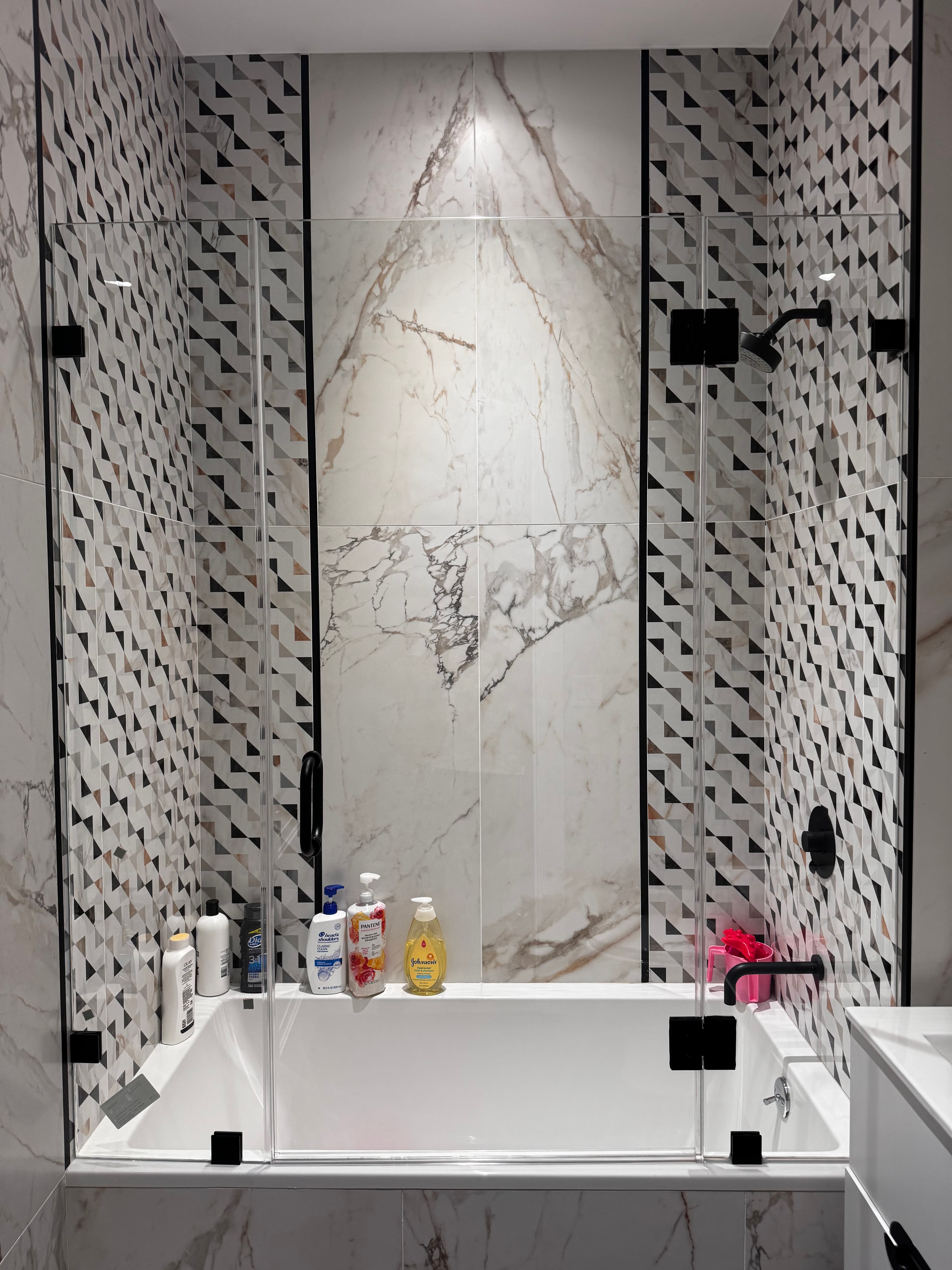 Panel + Door + Panel shower door installation in Brooklyn